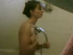 Using a concealed webcam, my wife's 37-year-old dark-brown aunt takes a shower.